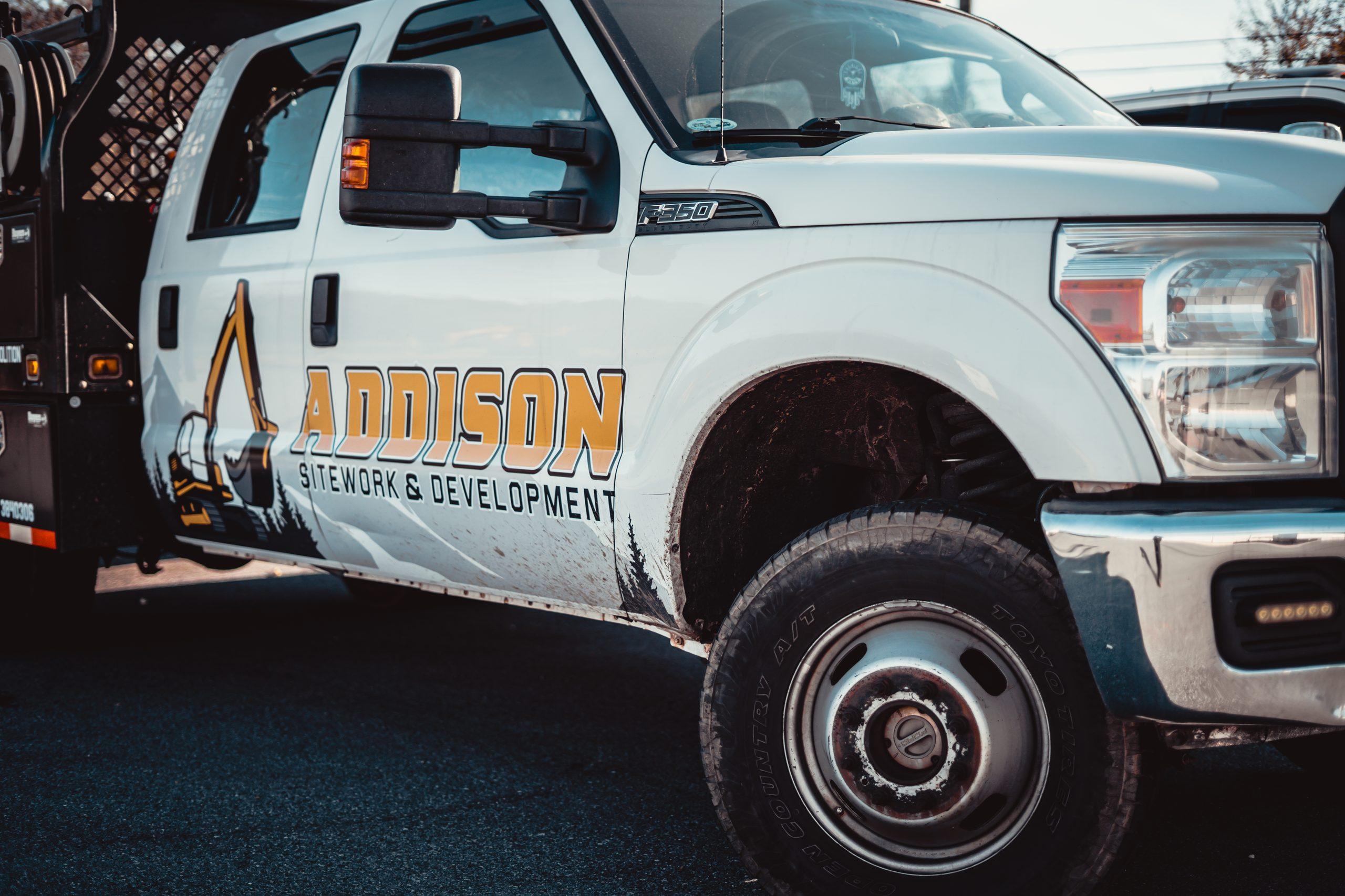 Addison Excavations F-350 work truck on a sitework project